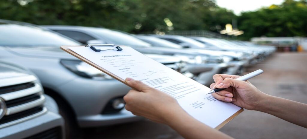 person signing vehicle fleet agreement